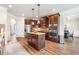 Well-equipped kitchen featuring granite countertops, stainless appliances, and a kitchen island at 2430 Tack Hill Ct, Dacula, GA 30019