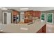 Kitchen featuring granite countertops, stainless steel appliances, and hardwood floors at 4910 Aldbury Ln, Suwanee, GA 30024