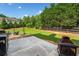Expansive backyard with a patio area and fire pit, perfect for outdoor gatherings at 501 Rabun Ct, Canton, GA 30115