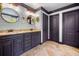 Bathroom featuring double vanity with granite countertop and tile floors at 501 Rabun Ct, Canton, GA 30115