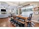 Charming dining area with a wooden table and a black and white rug at 501 Rabun Ct, Canton, GA 30115