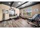 Exercise room with gym equipment, a mirror, and plenty of natural light at 501 Rabun Ct, Canton, GA 30115
