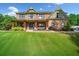 Beautiful brick home with a large front yard and welcoming porch at 501 Rabun Ct, Canton, GA 30115