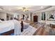 The primary bedroom is spacious with an ensuite and hardwood floors at 501 Rabun Ct, Canton, GA 30115