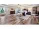 Spacious main bedroom with tray ceiling and hardwood floors at 501 Rabun Ct, Canton, GA 30115