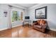The office has a picture window, hardwood floors, and designer chair at 501 Rabun Ct, Canton, GA 30115