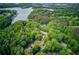 Beautiful lakefront property with stunning views and lush greenery, perfect for a serene lifestyle at 6006 Lanier Heights Cir, Buford, GA 30518
