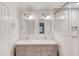 Bathroom features a double sink vanity and tiled shower at 6006 Lanier Heights Cir, Buford, GA 30518