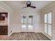 Breakfast area featuring dark wood cabinets, stone countertops and access to the deck at 6006 Lanier Heights Cir, Buford, GA 30518