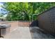 A backyard area with a small gate and a trash can at 789 Houston Mill Ne Rd # 5, Atlanta, GA 30329
