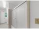 Clean bathroom features a tub with sliding glass doors at 789 Houston Mill Ne Rd # 5, Atlanta, GA 30329