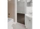 Cozy bathroom featuring a tub/shower combination with classic fixtures and a view of the adjacent room at 789 Houston Mill Ne Rd # 5, Atlanta, GA 30329