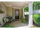 Cozy front porch with comfortable seating and a decorative entrance door at 4068 Cottage Oaks Dr, Acworth, GA 30101