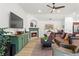 Comfortable living room featuring a fireplace, stylish furnishings, and ample natural light at 4068 Cottage Oaks Dr, Acworth, GA 30101
