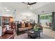 Open-concept living room with hardwood floors, dining area, and access to outdoor patio at 4068 Cottage Oaks Dr, Acworth, GA 30101