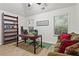 Bright home office with hardwood floors and a comfortable seating area at 4068 Cottage Oaks Dr, Acworth, GA 30101