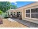 Outdoor patio with a dining table and grill, perfect for backyard entertaining at 4068 Cottage Oaks Dr, Acworth, GA 30101