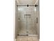 Sleek glass shower enclosure with modern fixtures and decorative tile inset at 4068 Cottage Oaks Dr, Acworth, GA 30101