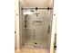 Modern glass shower with tile surround, rainfall shower head, and sliding door at 4068 Cottage Oaks Dr, Acworth, GA 30101