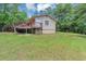 A view of the home's elevated deck and backyard at 4820 Yeager Rd, Douglasville, GA 30135