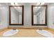 This bathroom features a double sink vanity with 2 mirrors at 4820 Yeager Rd, Douglasville, GA 30135