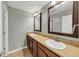 This bathroom features a double sink vanity with 2 mirrors at 4820 Yeager Rd, Douglasville, GA 30135