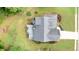 Overhead aerial view of the roof, deck and backyard with a full property view at 118 Valleyside S Dr, Dallas, GA 30157