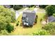 Aerial view of the backyard and deck area surrounded by lush greenery at 118 Valleyside S Dr, Dallas, GA 30157
