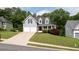 Charming two-story home with a well-manicured lawn, two car garage and inviting front porch at 118 Valleyside S Dr, Dallas, GA 30157