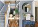 The foyer has a staircase, hardwood floors, and a blue cabinet under a decorative mirror at 118 Valleyside S Dr, Dallas, GA 30157