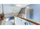 Bright landing features stylish railing and decor at 118 Valleyside S Dr, Dallas, GA 30157