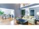Spacious living room with hardwood floors, neutral paint, and open layout to dining and kitchen at 118 Valleyside S Dr, Dallas, GA 30157