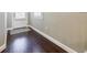 Dark hardwood floors lead the way from the front door at 2227 W Village Se Ln, Smyrna, GA 30080