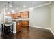 Spacious kitchen featuring granite countertops, stainless appliances and dining bar at 2227 W Village Se Ln, Smyrna, GA 30080