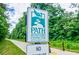 Signage for the Silver Comet Connector path, providing information about the trail and its connection to the community at 2227 W Village Se Ln, Smyrna, GA 30080