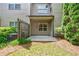 View of private patio with grass and landscape, perfect for outdoor entertaining at 2227 W Village Se Ln, Smyrna, GA 30080