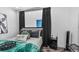 Cozy bedroom with stylish decor, soft lighting, and modern design elements, creating a relaxing retreat at 3120 Godby Rd, Atlanta, GA 30349