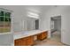 Bright bathroom with double sinks, lots of counter space, and an expansive mirror at 1411 Blackland Trl, Lawrenceville, GA 30043
