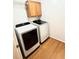 Well-equipped laundry room with modern washer and dryer at 1411 Blackland Trl, Lawrenceville, GA 30043