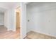 Bright laundry room with tile flooring, washer and dryer hookups, and shelving at 1595 Cedar Hl, Douglasville, GA 30134