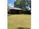 Large backyard with a covered patio area perfect for entertaining and relaxing at 3250 Valley Bend Rd, South Fulton, GA 30349