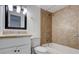 Bathroom with a bathtub, tiled shower, white vanity, and updated fixtures at 3250 Valley Bend Rd, South Fulton, GA 30349