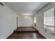 Dining room with hardwood floors, natural light, and an elegant chandelier at 3250 Valley Bend Rd, South Fulton, GA 30349