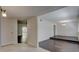 Bright living room with hardwood floors, white walls, and a view of an open dining area at 3250 Valley Bend Rd, South Fulton, GA 30349