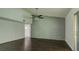 Spacious living room with hardwood floors, high ceilings, and access to the backyard through a sliding glass door at 3250 Valley Bend Rd, South Fulton, GA 30349