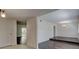 Bright living room featuring hardwood floors, white walls, and seamless access to the dining space at 3250 Valley Bend Rd, South Fulton, GA 30349