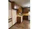 Traditional kitchen featuring wood cabinetry, wood countertops, and white appliances at 3594 Broxton Ln, Snellville, GA 30039