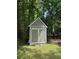 Outdoor storage shed with double doors offers practical space for tools and equipment at 3594 Broxton Ln, Snellville, GA 30039