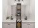 Updated bathroom features double sinks and modern fixtures at 944 Pine Ridge Dr, Stone Mountain, GA 30087