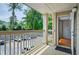Cozy balcony overlooking the parking and green space, perfect for relaxing outdoors at 4106 Chastain Park Ne Ct, Atlanta, GA 30342